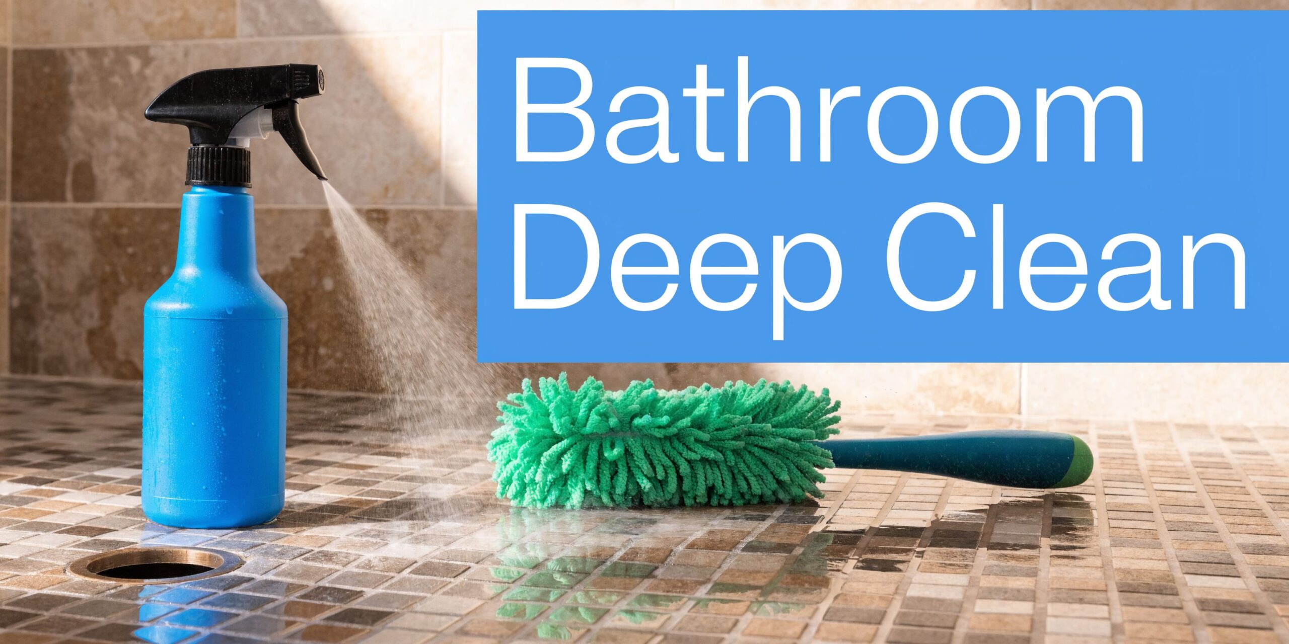 A blue spray bottle cleaning a tiled bathroom floor next to a green microfiber duster.